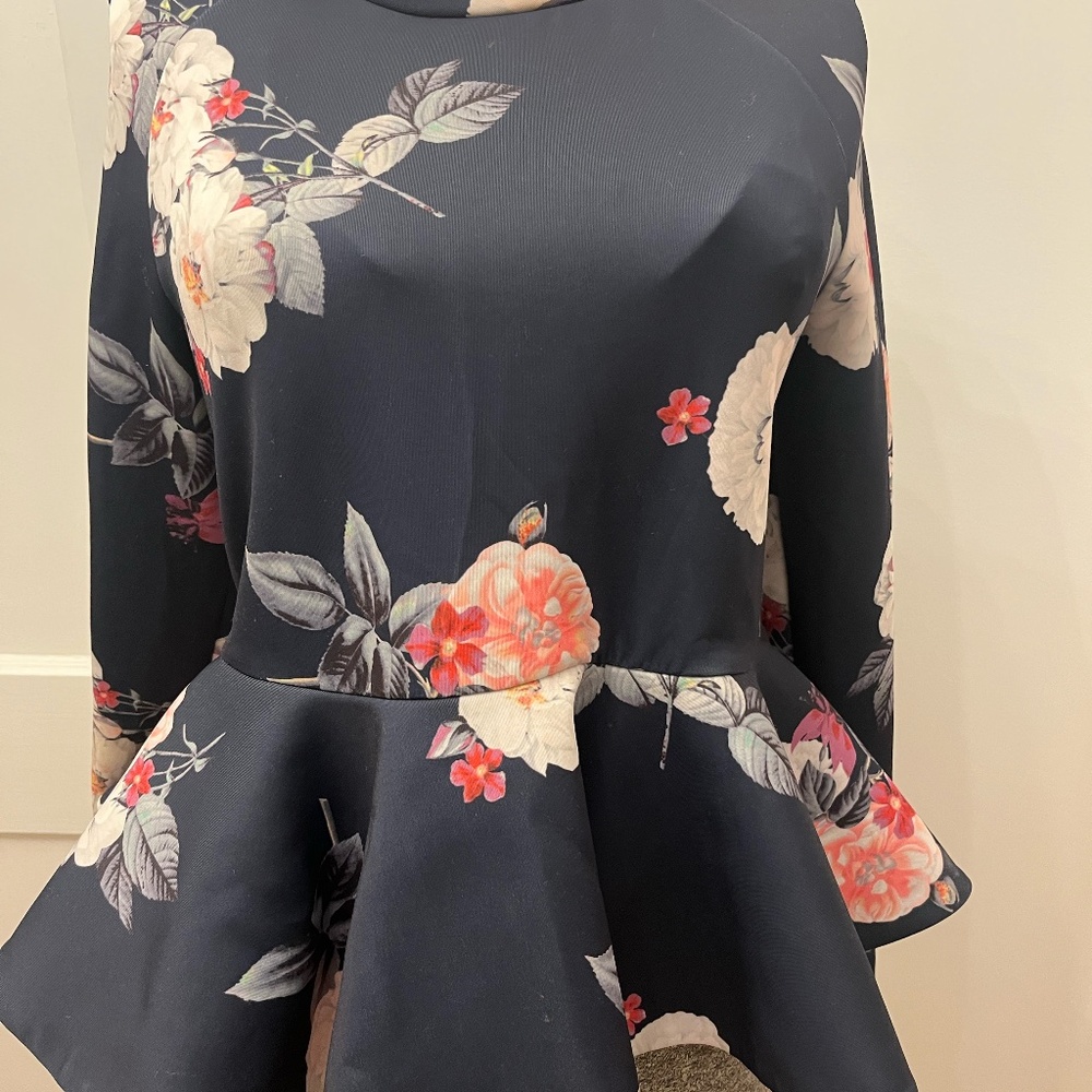 UNIQUE PEPLUM TOP